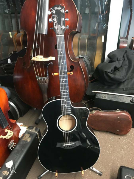 Taylor Acoustic Guitar 214 CE Cutaway Electric SOLD.
